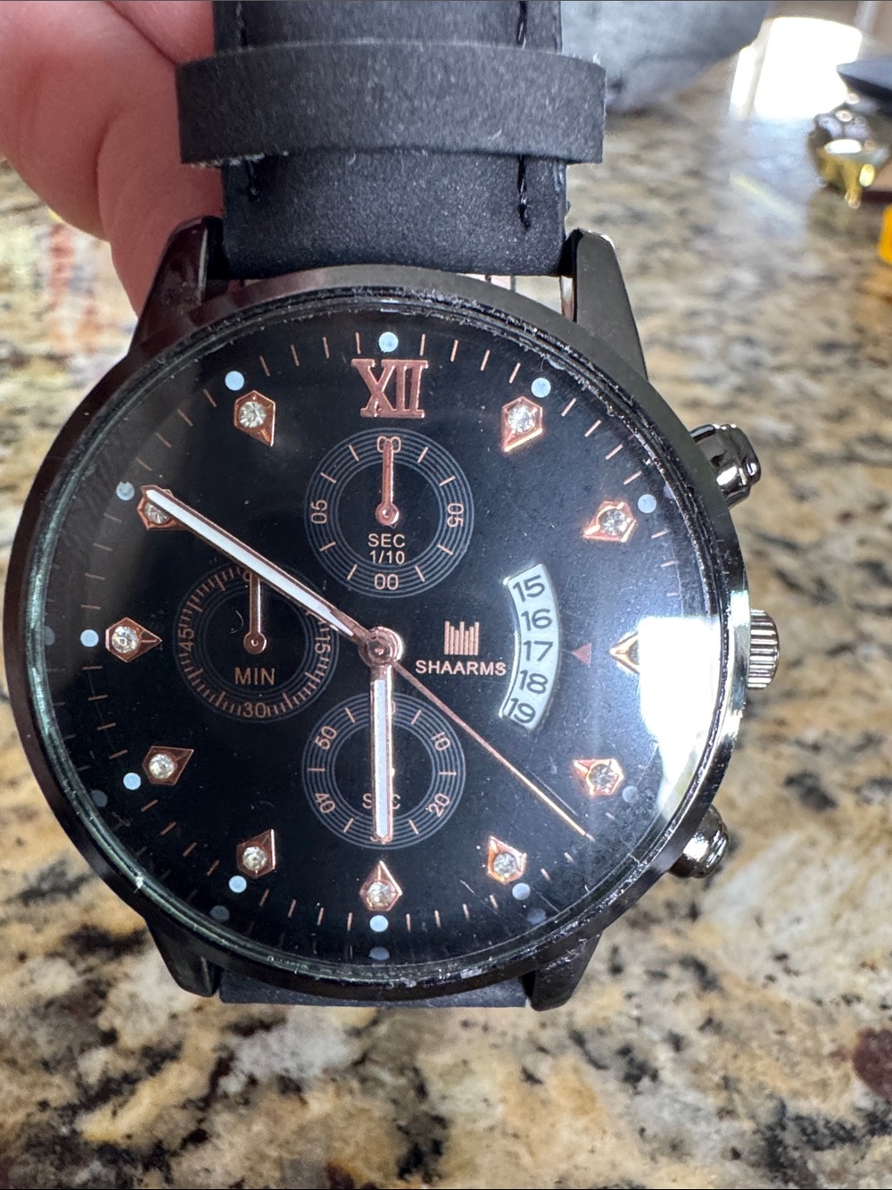 Black Dial Chronograph Watch with Rose Gold Accents